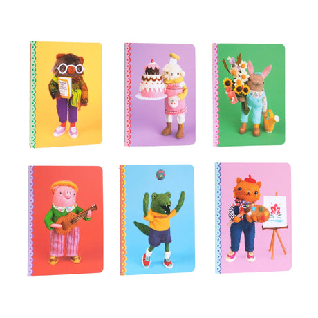 Tiny Journal | Cat Rabbit featuring six colorful small animal character journals with stitched binding and lined pages.