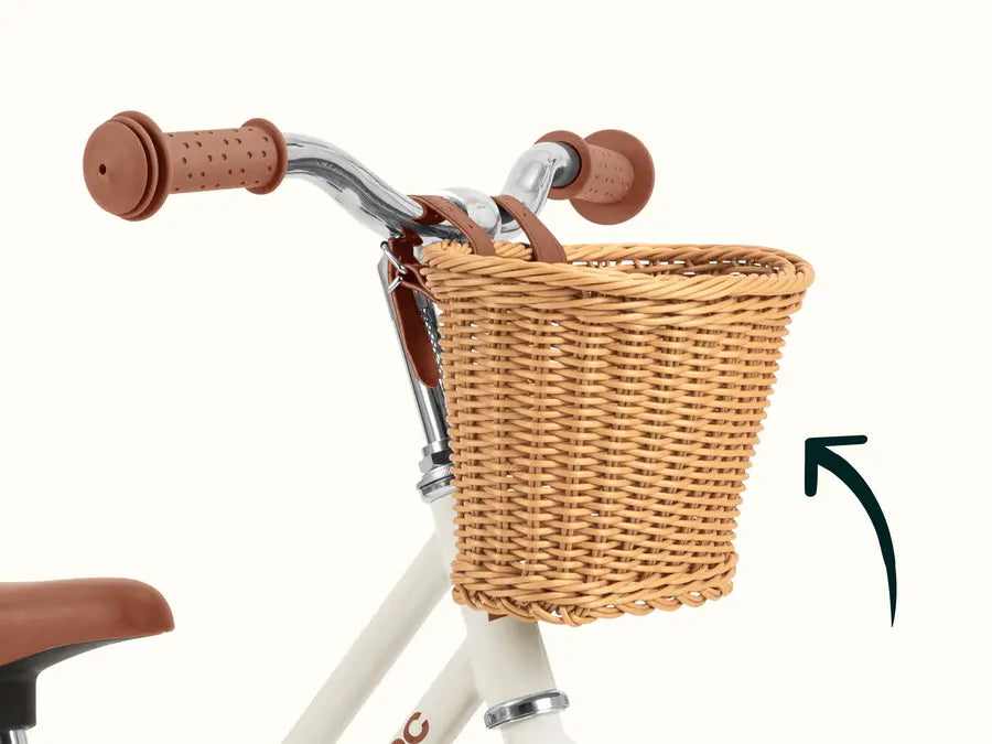 Baby Beaumont Balance Bike | Blush with woven basket and brown grips for toddlers learning balance and coordination.