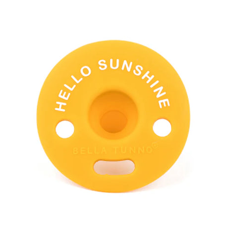 Pacifier | Hello Sunshine bright yellow soft silicone pacifier with breathable holes and clip attachment.