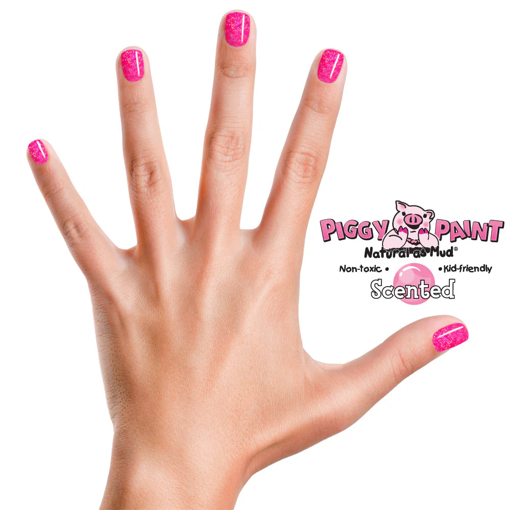 Hand with pink nails painted using Nail Polish Scented Bubble Gum Bash showing vibrant, non-toxic, kid-friendly color.