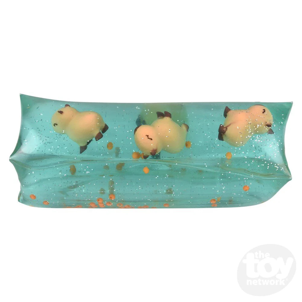 Capybara Water Wiggler squishy toy with floating capybara figures inside clear blue water for fidgeting fun.