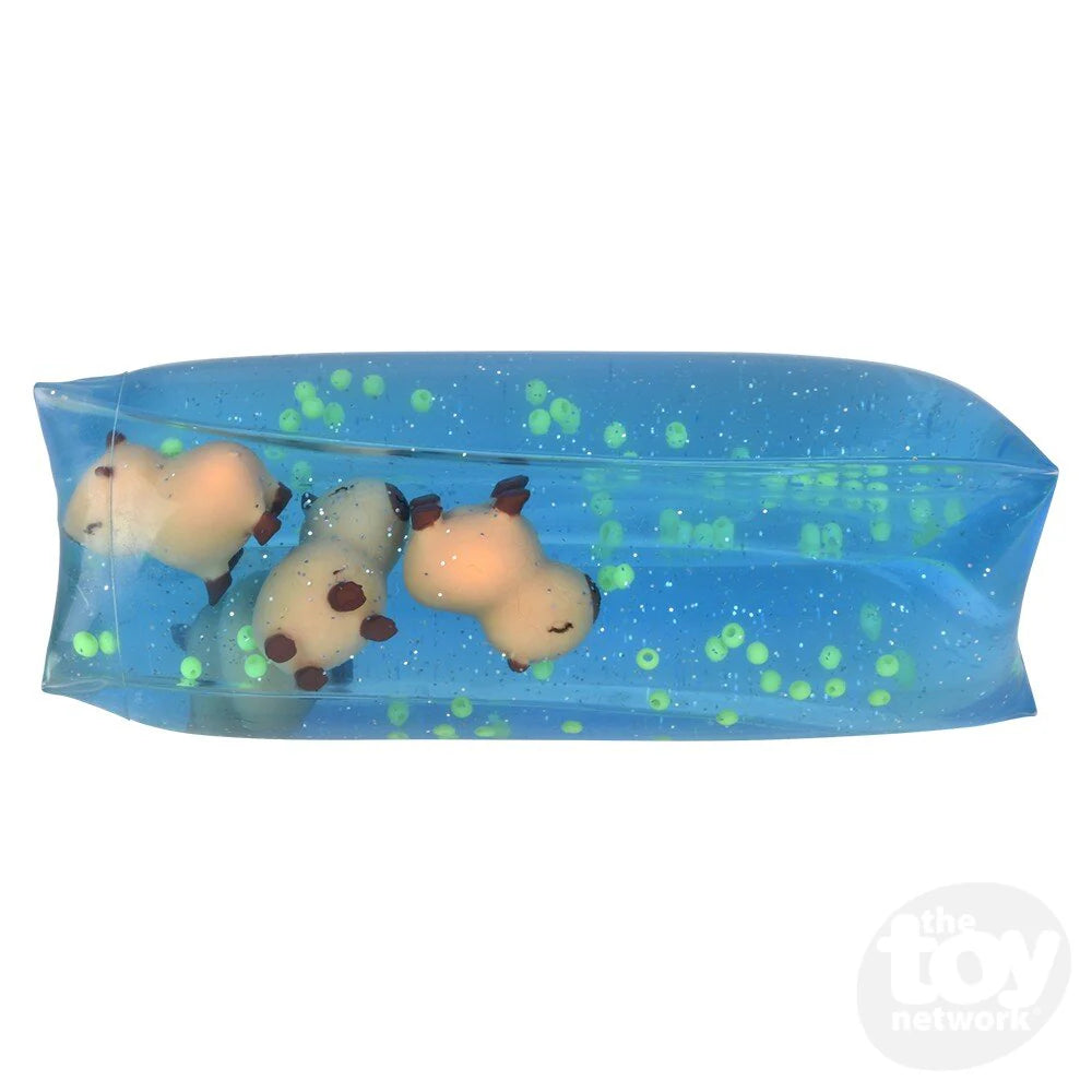 Capybara Water Wiggler with three floating capybara figures inside a clear blue water-filled squishy toy for fidgeting fun.