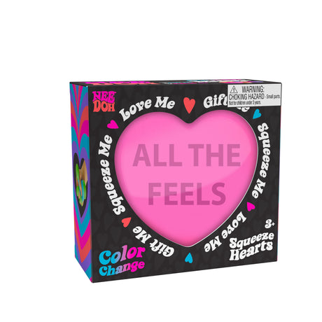 NeeDoh Color Change Squeeze Heart in pink with "All the Feels" text, colorful packaging, and groovy sayings.