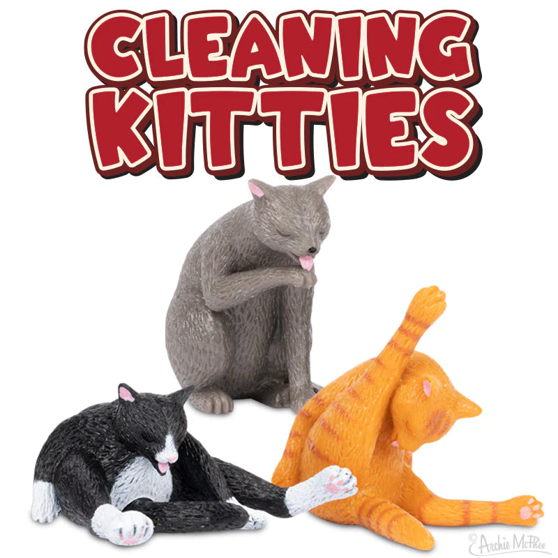 Cleaning Kitty soft vinyl cat figurines in three grooming poses, showcasing prideful personal hygiene and playful charm.