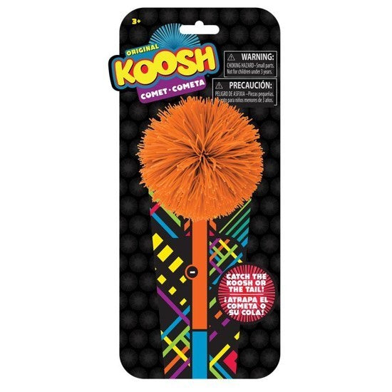 Koosh Comet with bright orange ball and long tail, perfect for swinging and throwing fun for ages 3 and up.