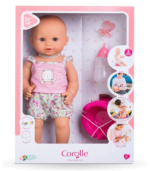 Drink & Wet Emma doll with soft vinyl body, refillable bottle, pacifier, and potty for interactive play and potty training.