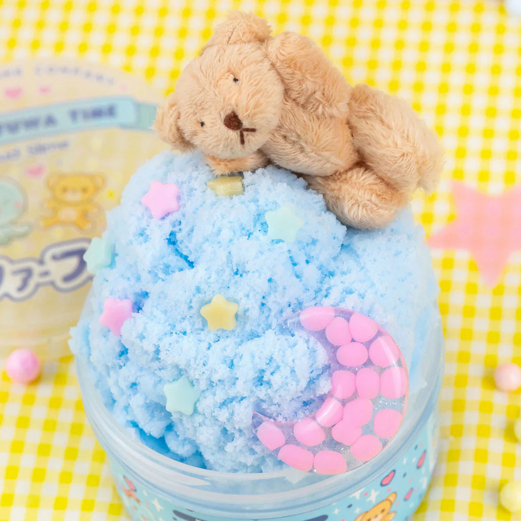 Fuwa Fuwa Time Icee Cloud Slime with blue fluffy texture, star and moon charms, and a small cuddly bear on top.