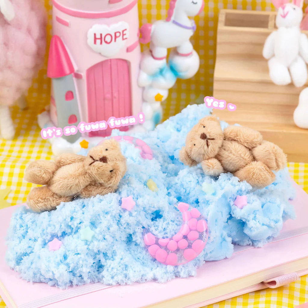 Fuwa Fuwa Time Icee Cloud Slime with fluffy blue texture, pink moon, stars, and cuddly bear charm on pastel background.
