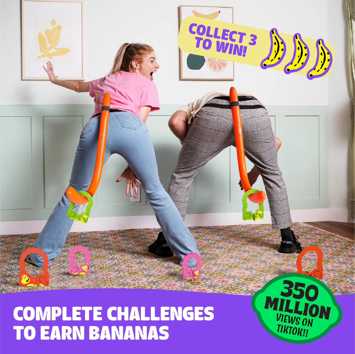 Two players wearing monkey tails compete in the party game It’s Bananas! trying to collect bananas and win.