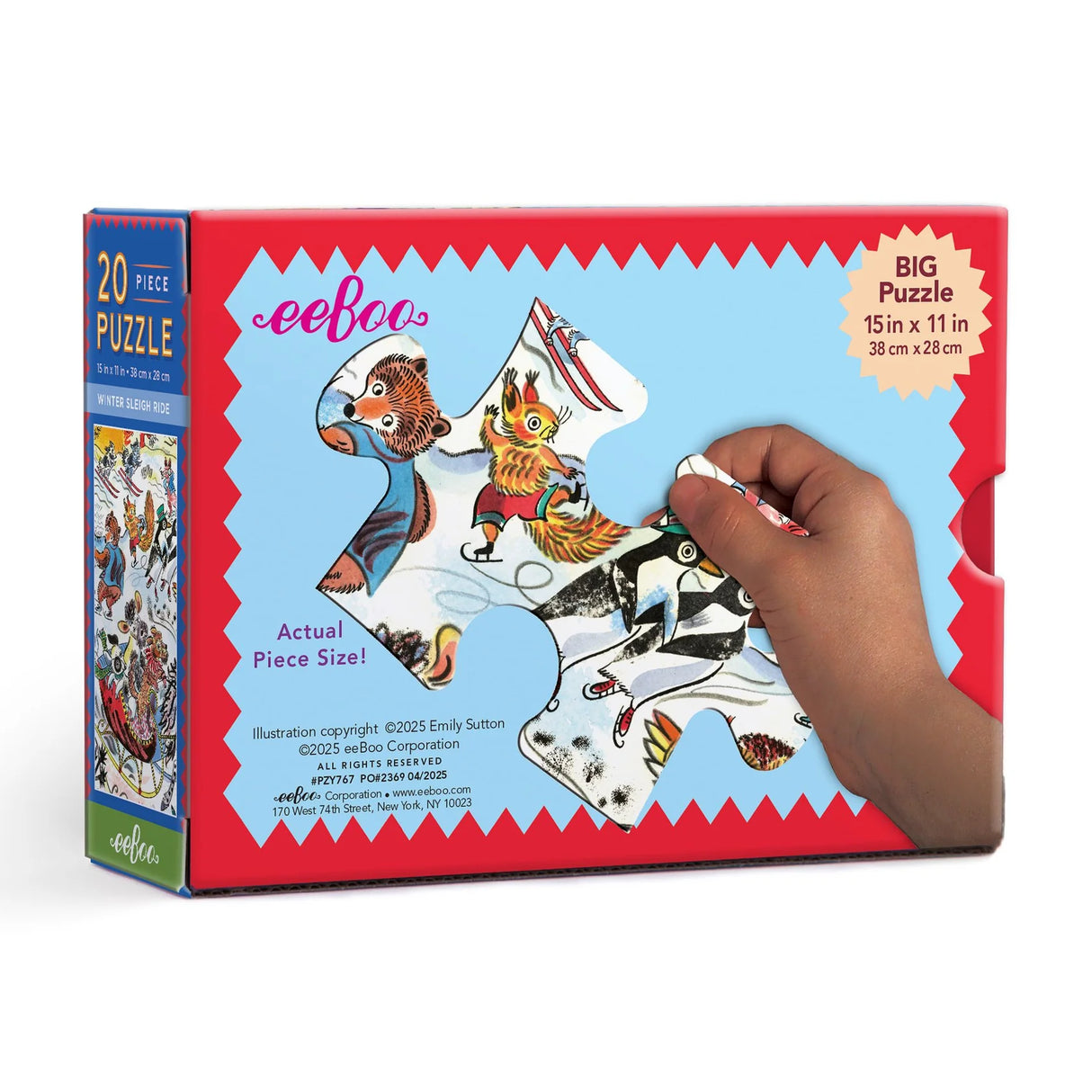 Hand assembling a colorful 20-piece winter puzzle with animals sledding and skating outdoors