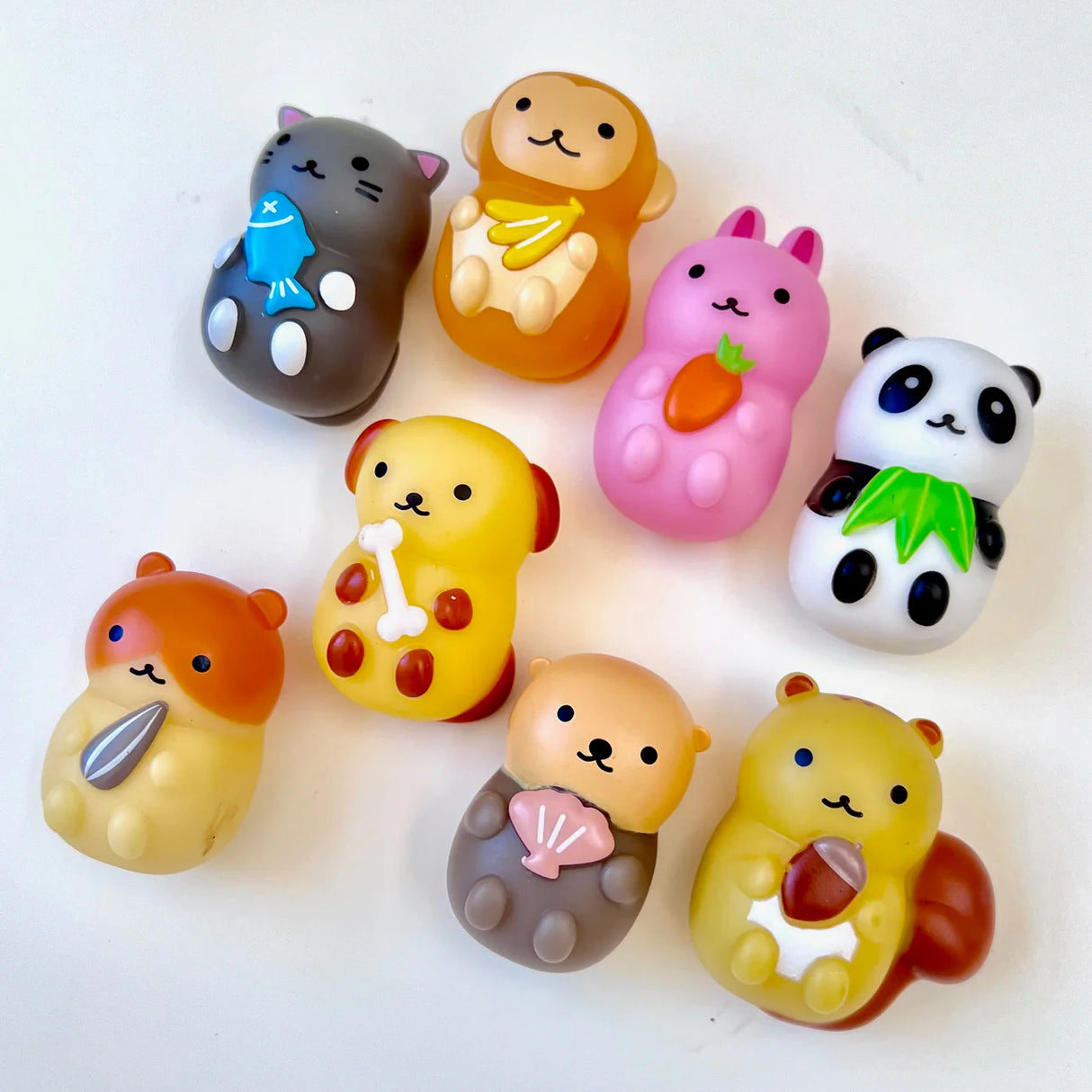 Animal Snack Time Figurine set featuring cute animal characters holding various snacks, made by Sanyodo Japan.