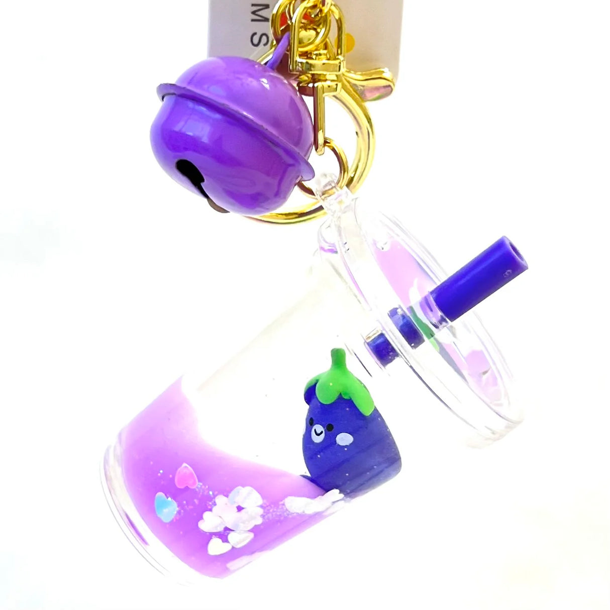 Eggplant Floaty Charm Keychain featuring a cute eggplant in a clear purple drink with a purple bell accessory.
