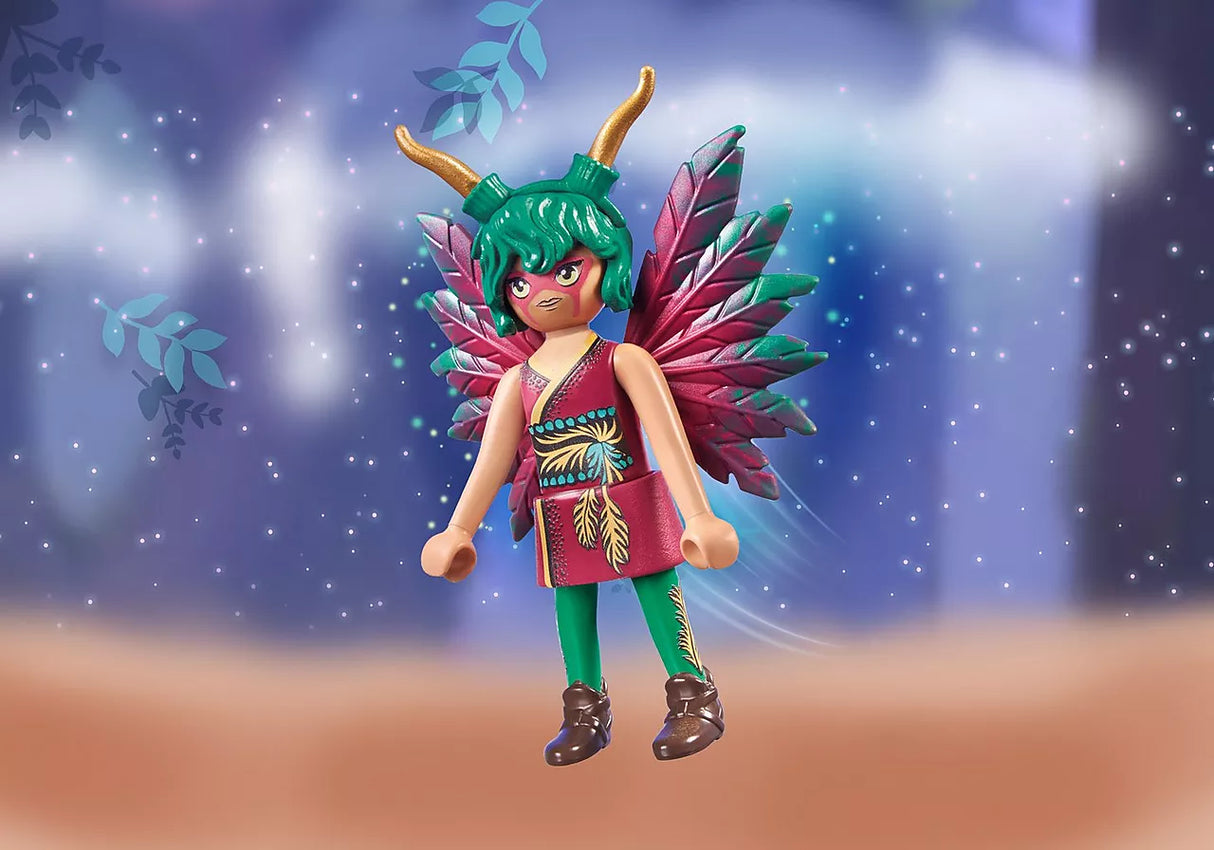 Ayuma | Knight Fairy Josy figure with green hair, red and green outfit, wings, and horned headband in a magical forest setting.