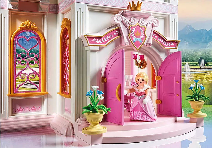 Princess | Castle toy with pink doors, elegant staircase, queen figure, and detailed royal accessories in a grand princess castle setting.