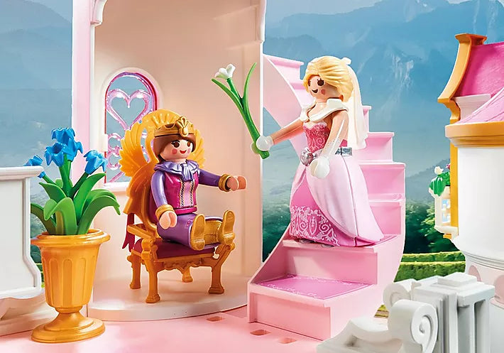 Princess | Castle with queen and princess figures inside elegant pink castle with staircase, throne, and floral decorations.