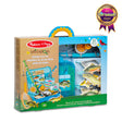 Melissa & Doug Let's Explore Fishing Play Set with wooden rods, fish, reversible mat, and tackle box in packaging.
