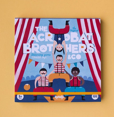 Acrobat Balancing Game box featuring colorful acrobat figures forming a human tower on a circus stage.