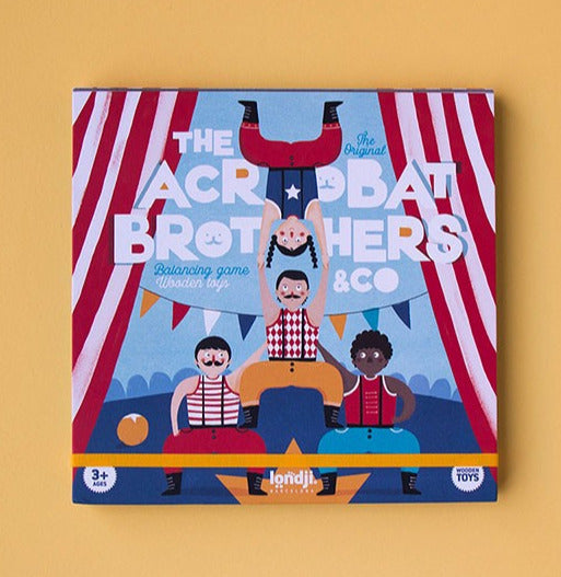 Acrobat Balancing Game box featuring colorful acrobat figures forming a human tower on a circus stage.