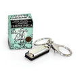 Silver harmonica on a key-ring sitting next to its box, which measures 1.25" x .75" 1.5". For ages 3 and up.