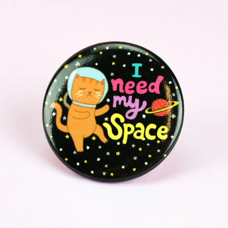I Need My Space Cat Button showing an orange cat in a space helmet floating among stars and a planet.