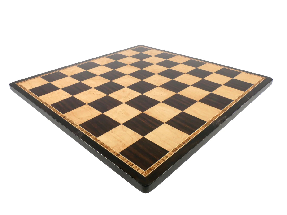 Chess Board Ebony & Birdseye Maple with inlaid frame, beveled edge, and 2-inch squares, measuring 17 inches.