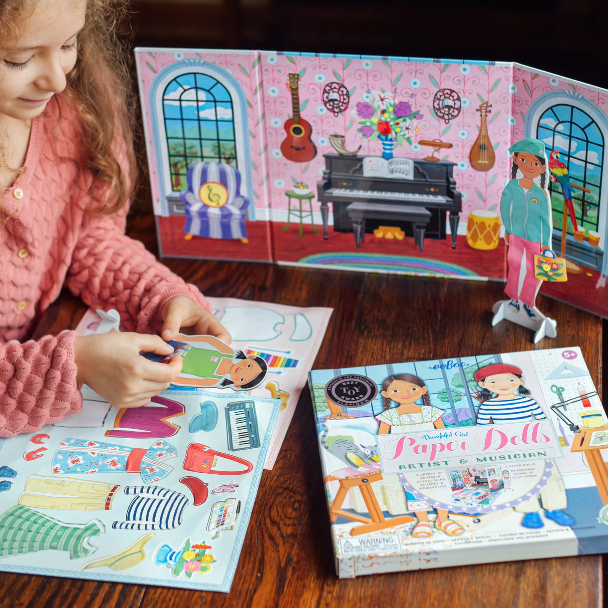 Paper Dolls | Artist & Musician set with detailed clothing, backgrounds, and stickers for imaginative play aged 5 and up.