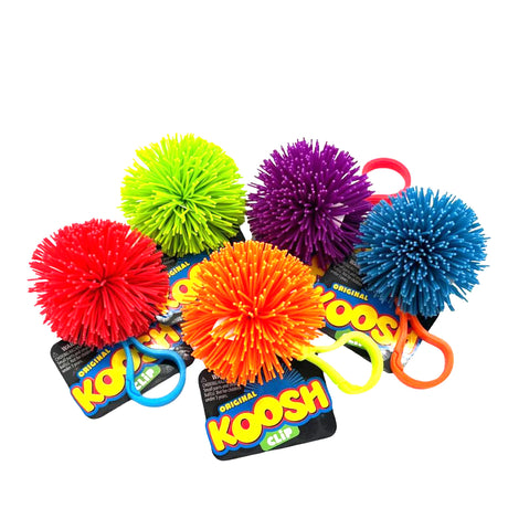 Colorful Koosh Clip toys with rubber filaments and clips, perfect for on-the-go fun with the classic 90s Koosh Clip.
