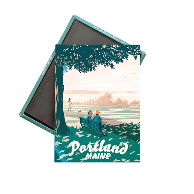 Portland Maine Magnet showing an illustration of Eastern Prom with people relaxing on a bench by the water.