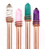 Mystic Crystal Pen set with rose gold barrels and assorted crystal tops in clear, pink, green, and purple colors.