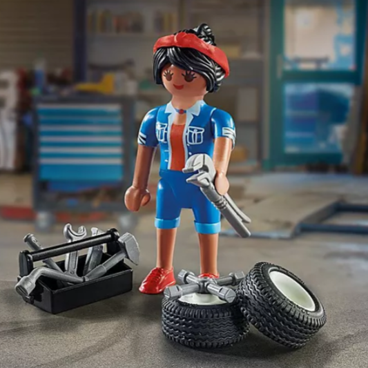 Special Plus | Mechanic figure with tools, tires, and toolbox ready for imaginative play in a garage setting.