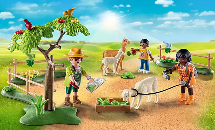 Country | Alpaca Walk Playmobil set showing figures, alpacas, birds, tree, fence, and accessories in a sunny outdoor scene.