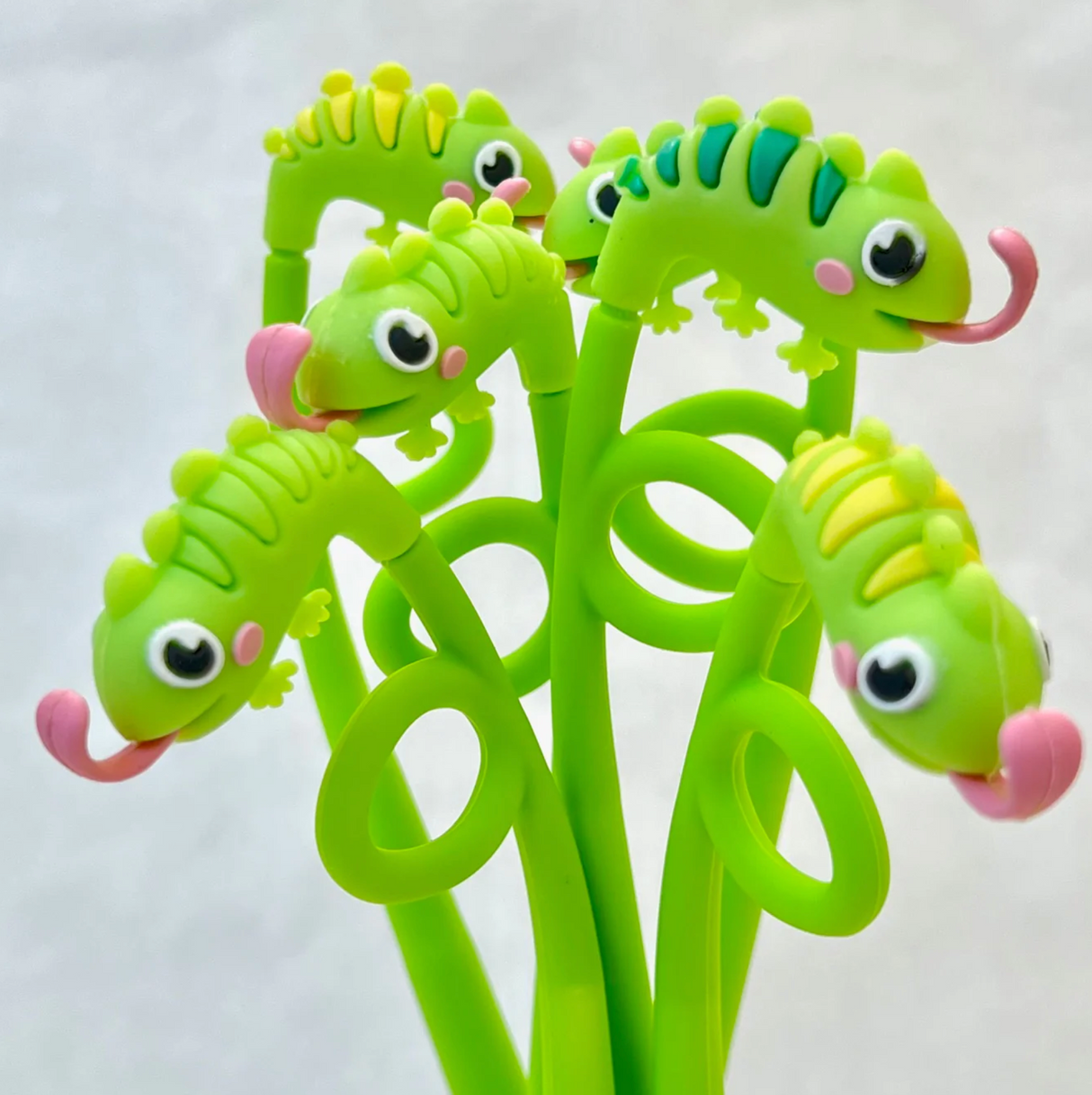 Chameleon Wiggle Gel Pen with flexible, vibrant green chameleon toppers for a fun and smooth writing experience.