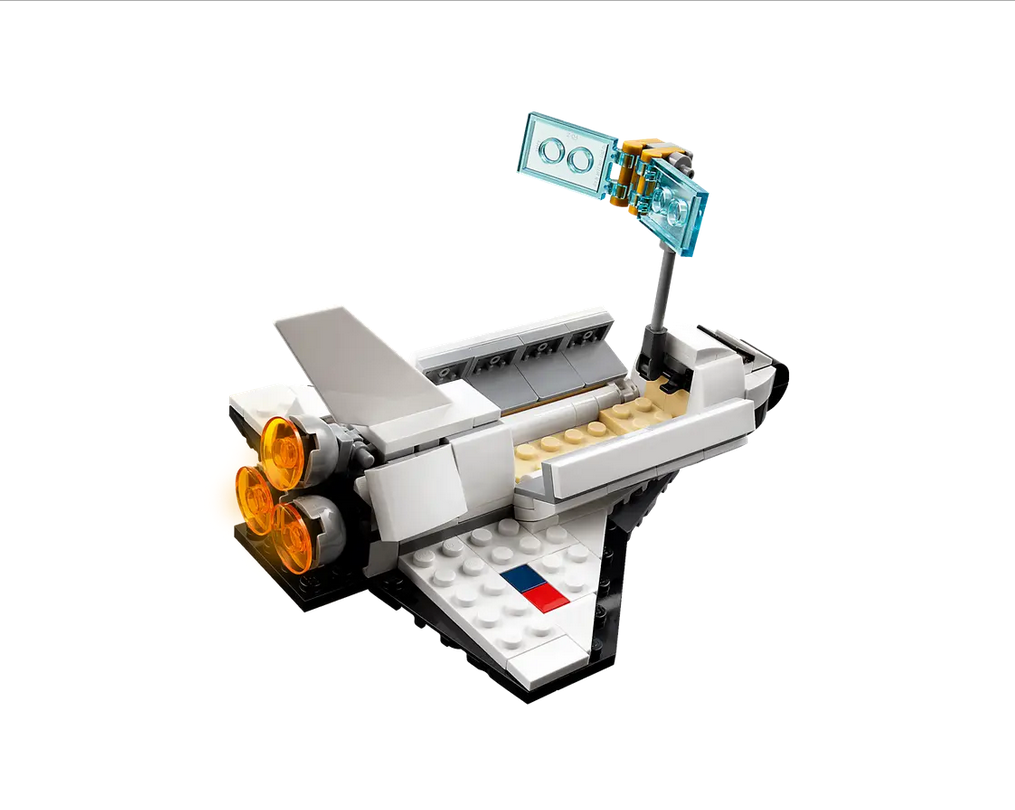 Creator Space Shuttle building toy featuring a detailed white shuttle with translucent orange thrusters and a small satellite dish.