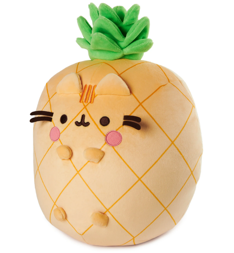 Pusheen Pineapple plush toy shaped like a pineapple with green leaves, rosy cheeks, and soft fabric for squeezing.