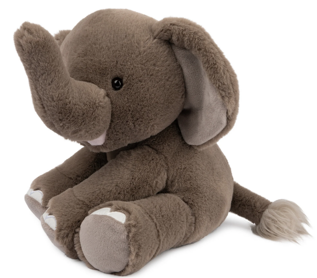 Elephant Chai plush toy sitting upright with a soft gray body, smiling face, and warm brown eyes.