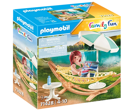 Family Fun | Hammock Playmobil set with figure relaxing in hammock, umbrella, table, and nature background.