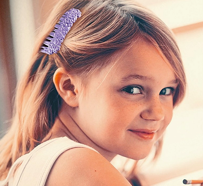 Princess Magic | Rainbow Pegasus Caring Set featuring a smiling child with a lavender hair comb accessory.