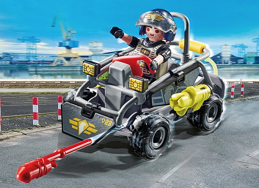 City Action | Tactical Unit Multi-Terrain Quad with officer figure driving on a city road, featuring rugged wheels and action gear.