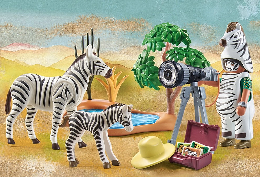 Wiltopia Animal Photographer playset with zebra foal, mother, camera, and figure in zebra costume by PLAYMOBIL.