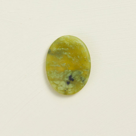 Soothing Stone | Xiuyan Jade oval-shaped crystal with soft matte finish, perfect for mindful and wellness practices.