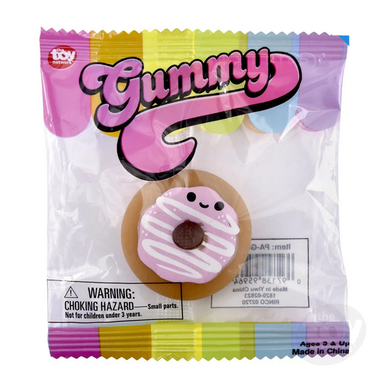 Gummy Fast Food small fidget toy shaped like a smiling pink frosted donut with white drizzle in colorful packaging.