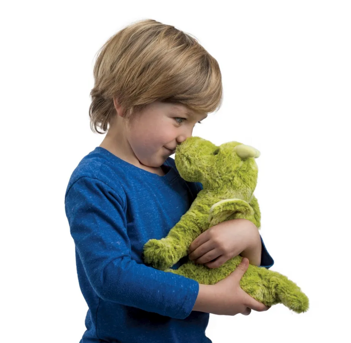 Young child in blue shirt hugging a soft plush Dragon Lucian with green mottled fabric and small wings.