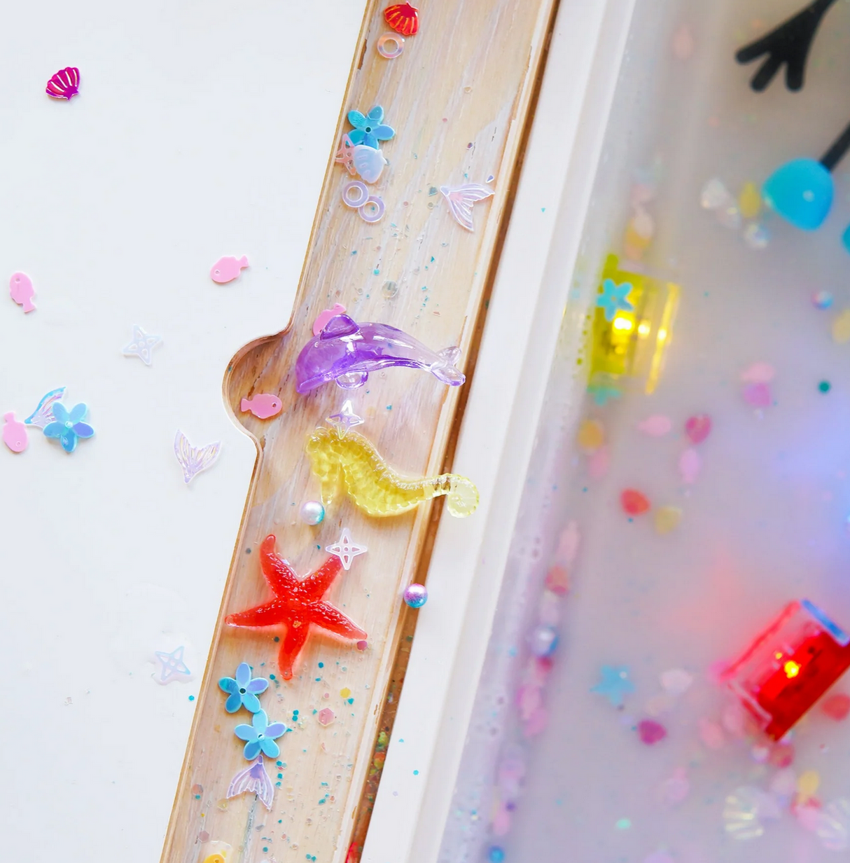 Sensory Jar Fun Fillers | Under the Sea with colorful sea creatures and accessories for sensory play.