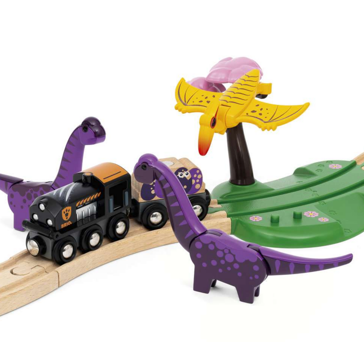 Dinosaur Adventure Set featuring a black engine train, purple dinosaurs, yellow pteranodon, and wooden tracks with scenic pieces.
