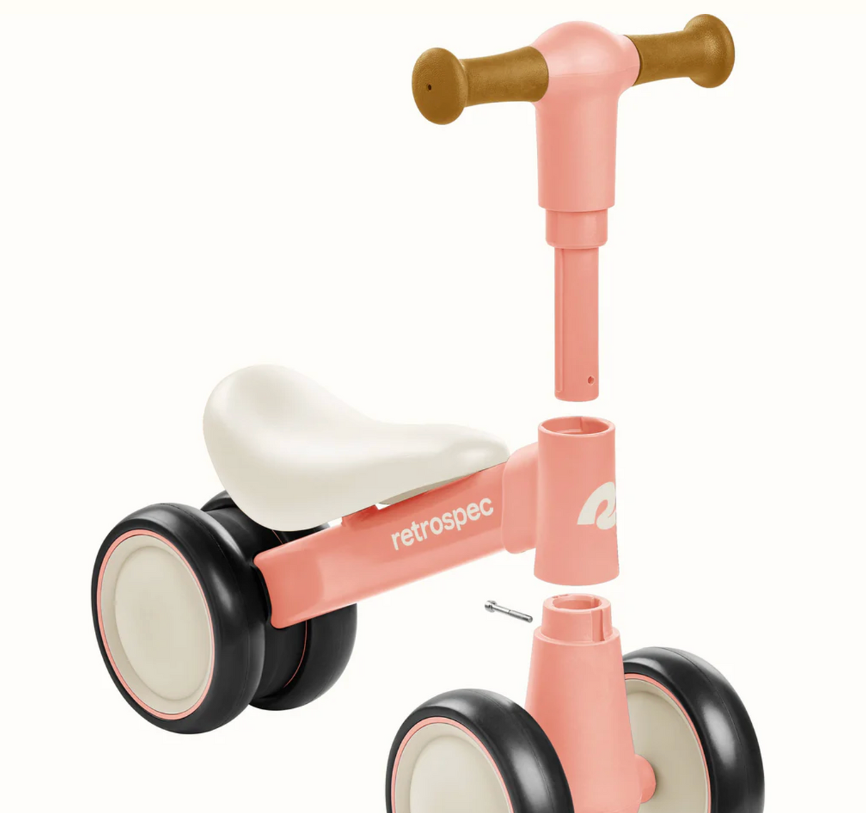 Cricket 2 Baby Walker Balance Bike baby pink with no-scratch wheels and 135° limit steering for safe indoor riding.