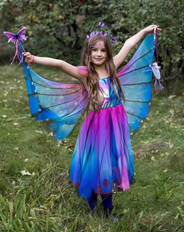 Butterfly Twirl Dress & Wings | Blue Size 3-4 worn by child outdoors with vibrant blue and purple butterfly wings.