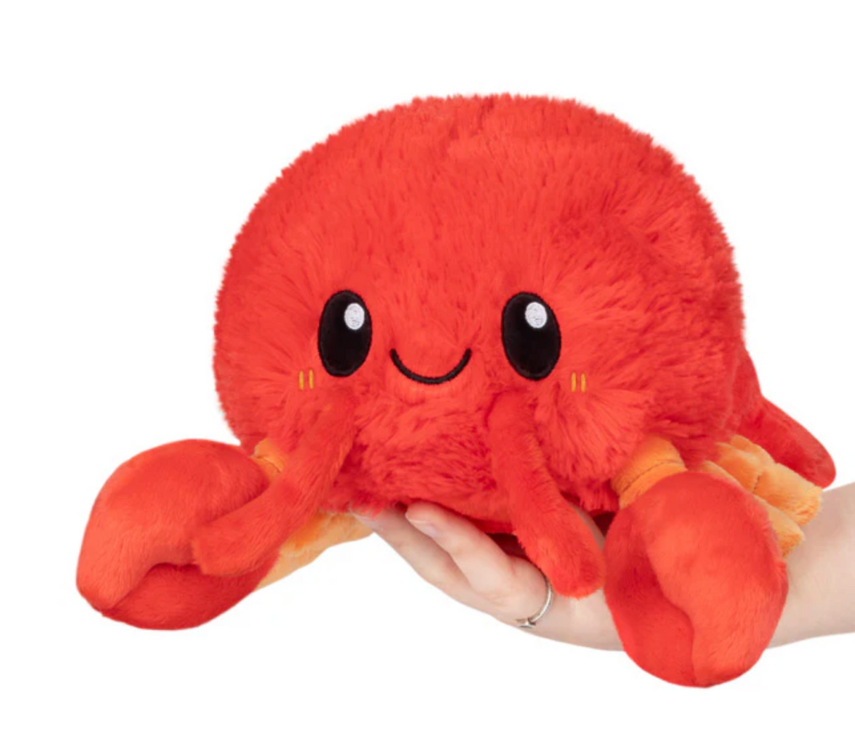 Soft and bright red Lobster Mini plush toy with smiling face, perfect for all ages, held in a hand.
