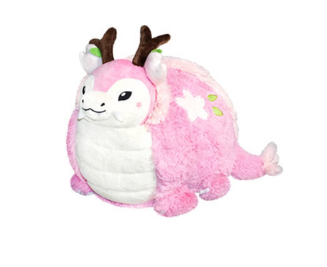 Sakura Dragon plush with pink floral design, antlers, and friendly face, perfect for all ages and cozy decor.