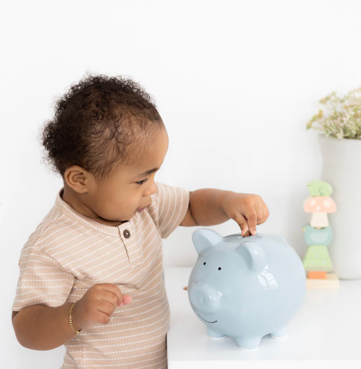 Ceramic Piggy Bank | Blue with rubber stopper and felt feet, perfect for teaching kids savings in a fun way.