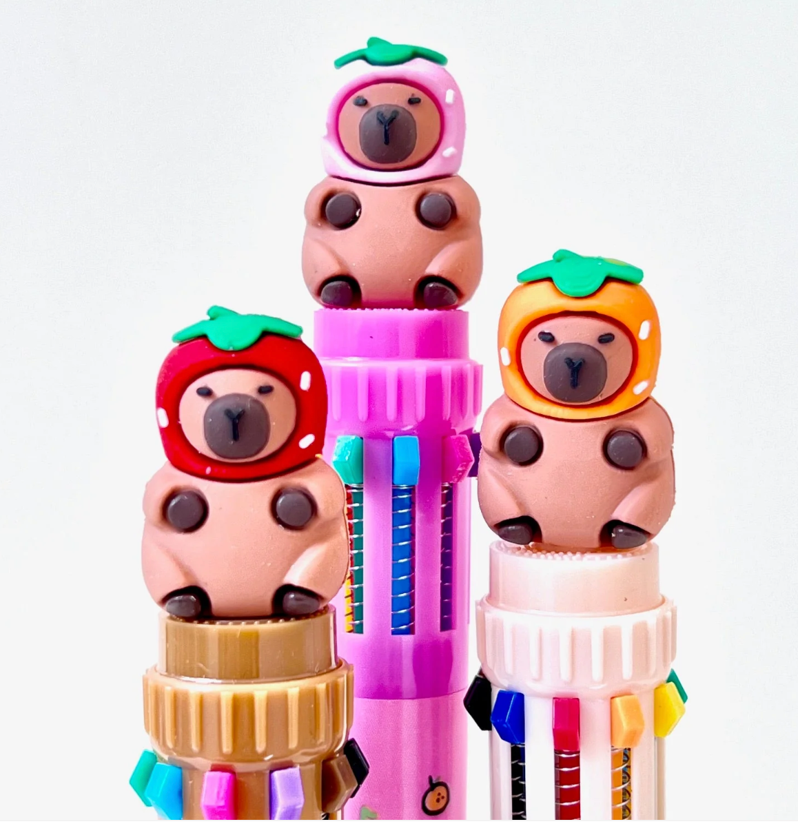 10 Color Pen | Capybara with Hat featuring cute capybara toppers in colorful retractable pens with fine-tip writing.